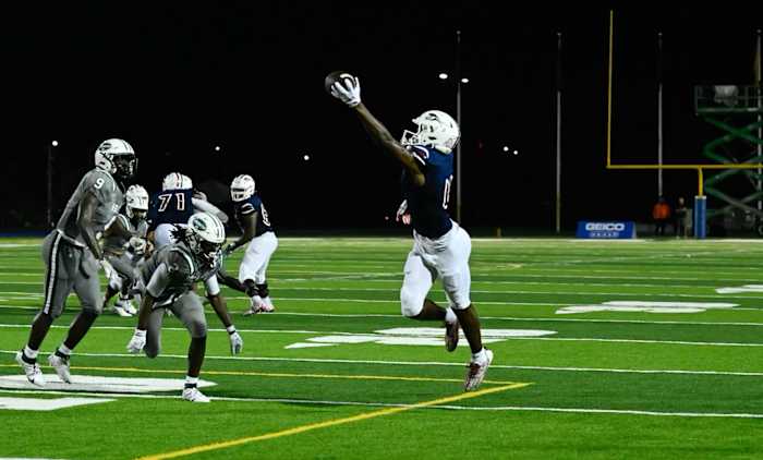 Jeremiah Smith (making a stunning one-handed touchdown grab against Miami Central earlier this year) said a potential flip from Ohio State to Miami would be "tempting" should his teammate and quarterback Cedrick Bailey also make the flip after receiving and offer from the Hurricanes this week. He, Bailey and Joshia Trader, already a Miami commit, have been friends and teammates since they were 11.